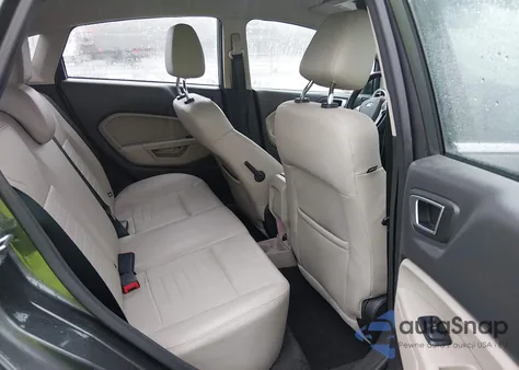 2016 Ford Fiesta Titanium z USA, uszkodzony, nr VIN 3FADP4FJ9GM188356